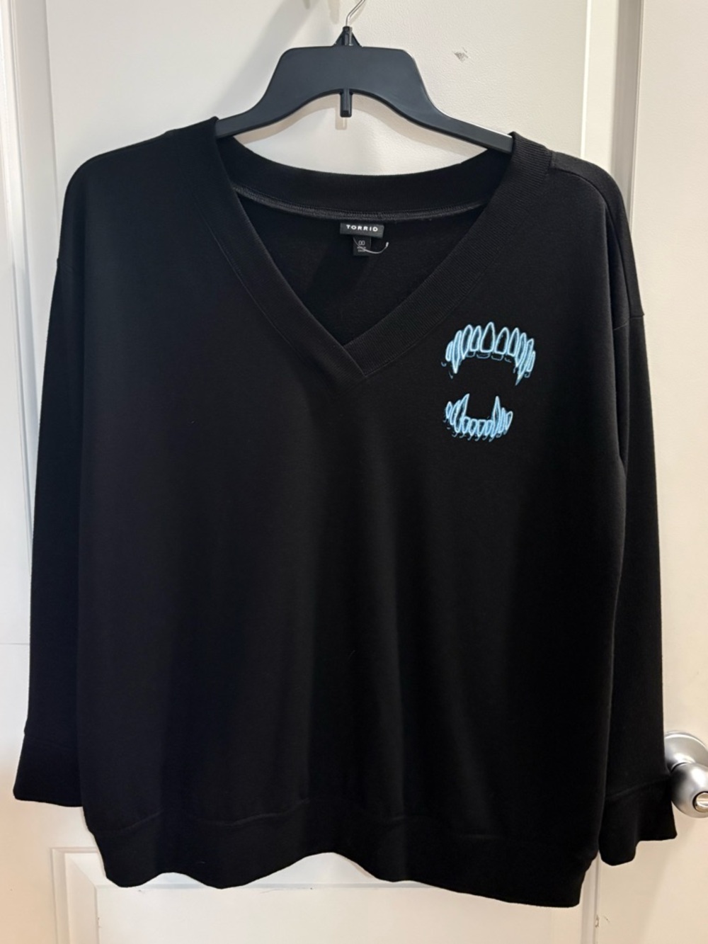 torrid Black V-Neck Sweater with Light Blue Dracula Fangs Graphic